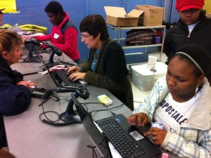 Volunteers Working The Computers
